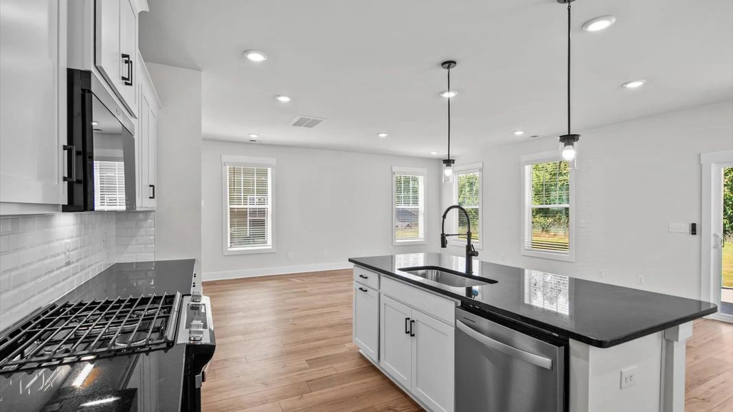 Furnished interior view inside a new home in Farms at Bellingham, Mooresville (Image 4). Furnished interior view inside a new home in Farms at Bellingham, Mooresville (Image 4).