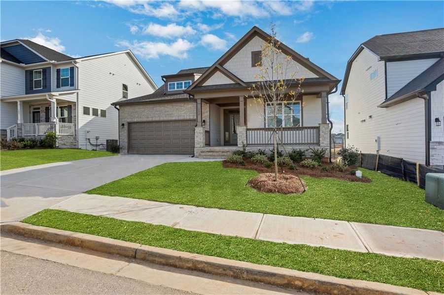 Front exterior of a new home in Twin Lakes, Hoschton, GA, highlighting curb appeal (Image 25).