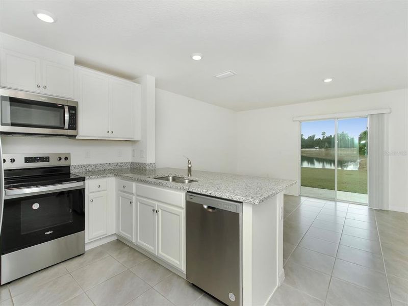 Furnished interior view inside a new home in , Harmony (Image 8).