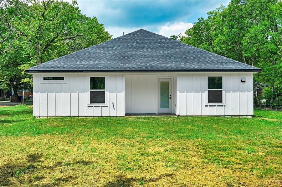 Front exterior of a new home in , Ennis, TX, highlighting curb appeal (Image 21). Front exterior of a new home in , Ennis, TX, highlighting curb appeal (Image 21).