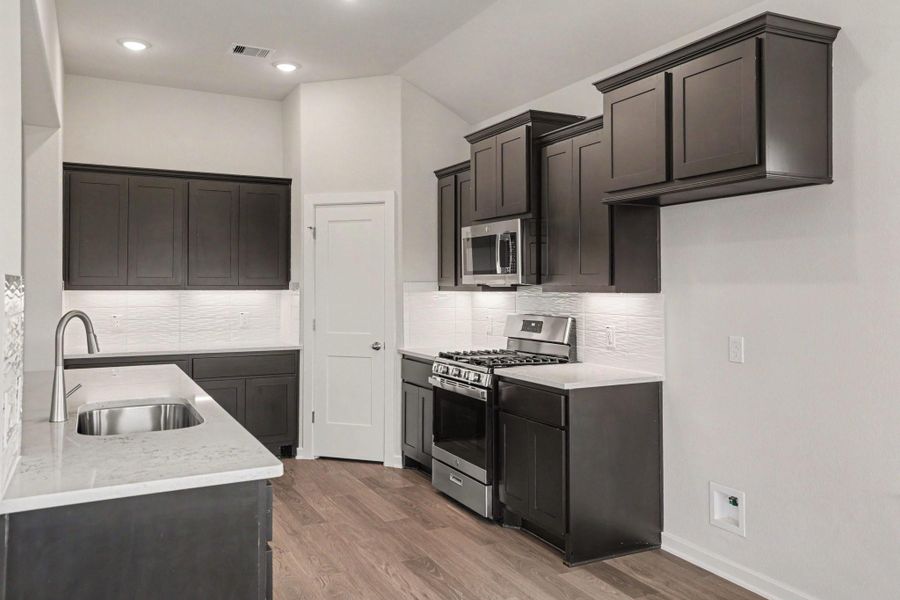 Furnished interior view inside a new home in Clear View Estates, Willis (Image 6).
