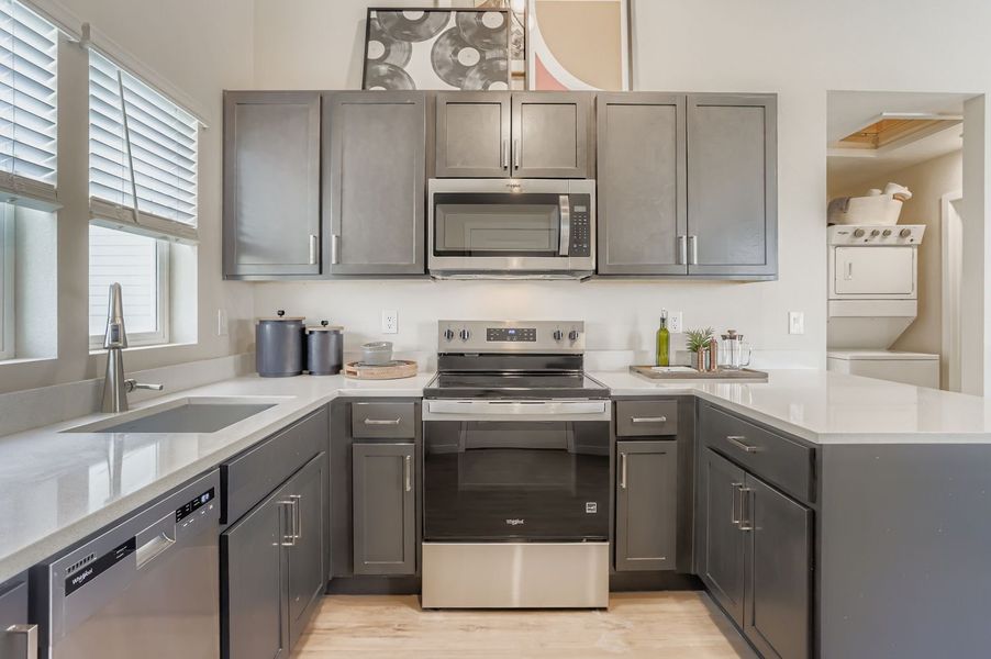 Furnished interior view inside a new home in Barefoot, Firestone (Image 8).
