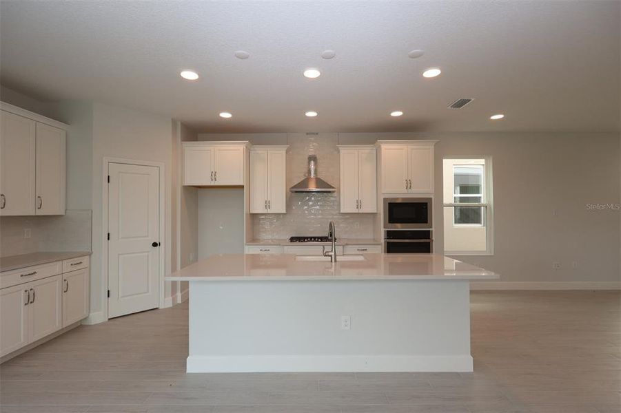 Furnished interior view inside a new home in Lake Star at Ovation, Winter Garden (Image 7).
