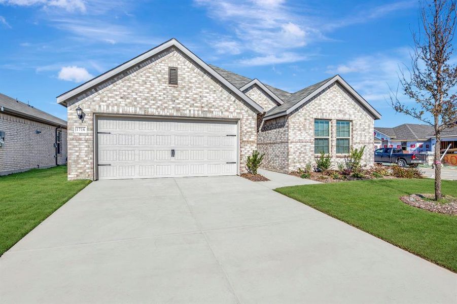 Front exterior of a new home in Verandah, Royse City, TX, highlighting curb appeal (Image 25). Front exterior of a new home in Verandah, Royse City, TX, highlighting curb appeal (Image 25).