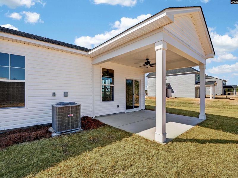 Exterior details and patio area of a home in Old Charleston Acres, Pelion (Image 24).