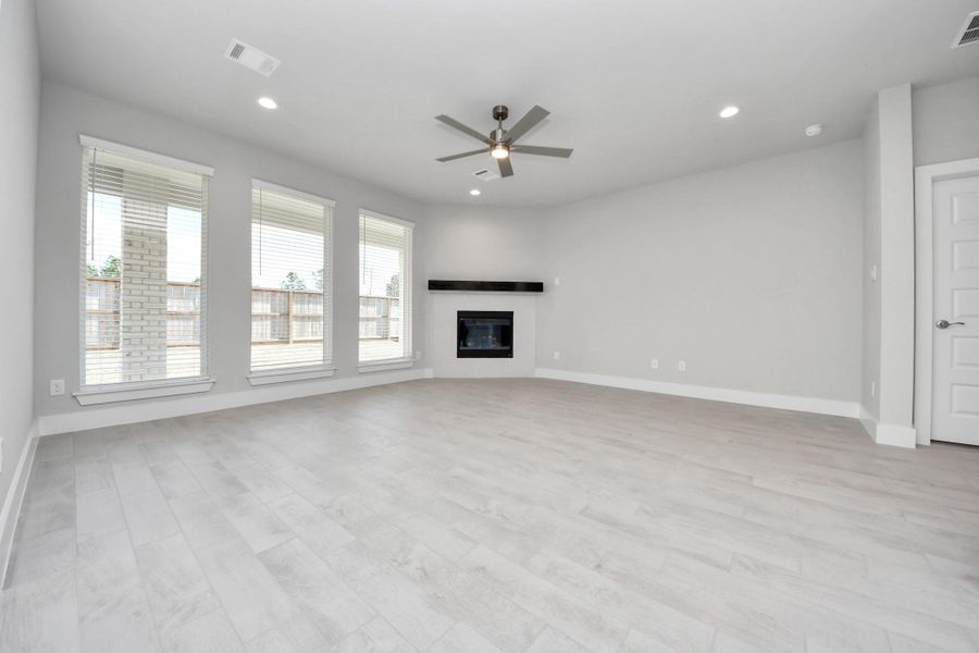 Take another glimpse into the heart of the home with this additional view of the family room—a sprawling space ready to accommodate all your gatherings.