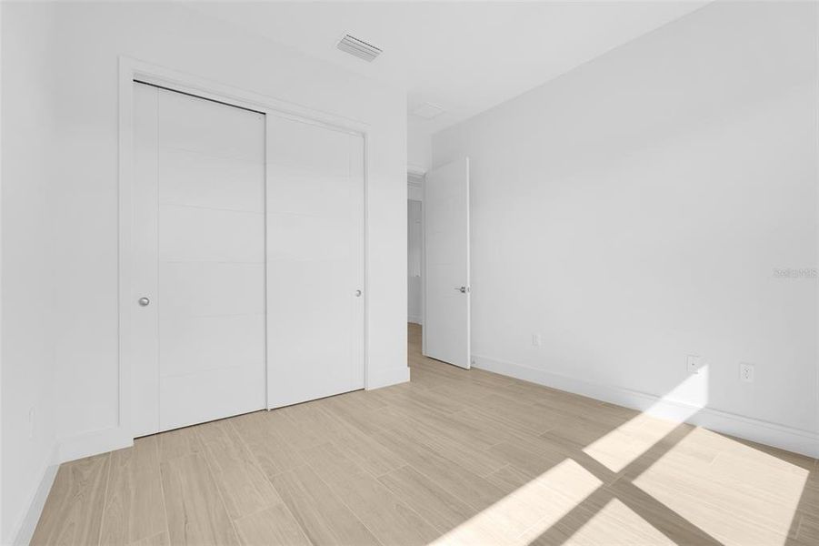 Spacious, unfurnished interior of a new home in Hampton Green at Providence, Davenport (Image 32).