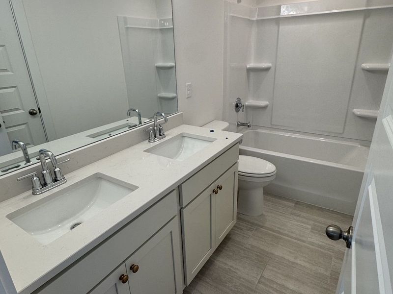 Furnished interior view inside a new home in Woods Crossing, Gallatin (Image 14).