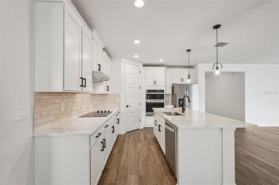 Furnished interior view inside a new home in Oakfield Trails - Signature Series, Parrish (Image 7).