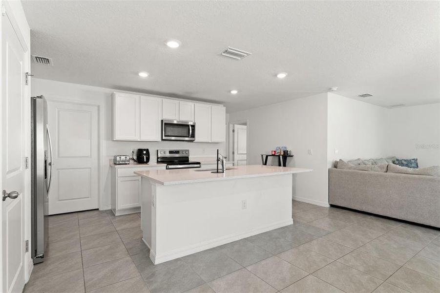 Furnished interior view inside a new home in Harvest Ridge, Zephyrhills (Image 9).