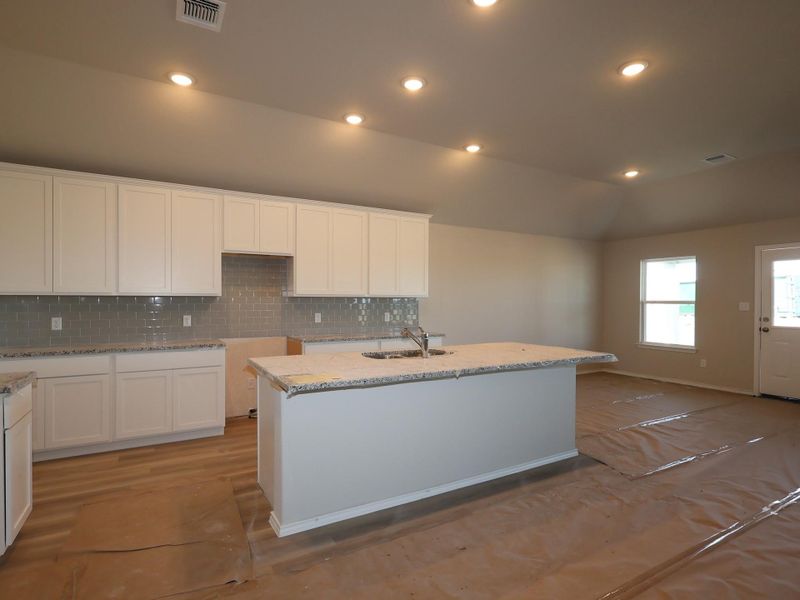 In-progress construction of a new home in Carillon, Manor, TX (Image 15).