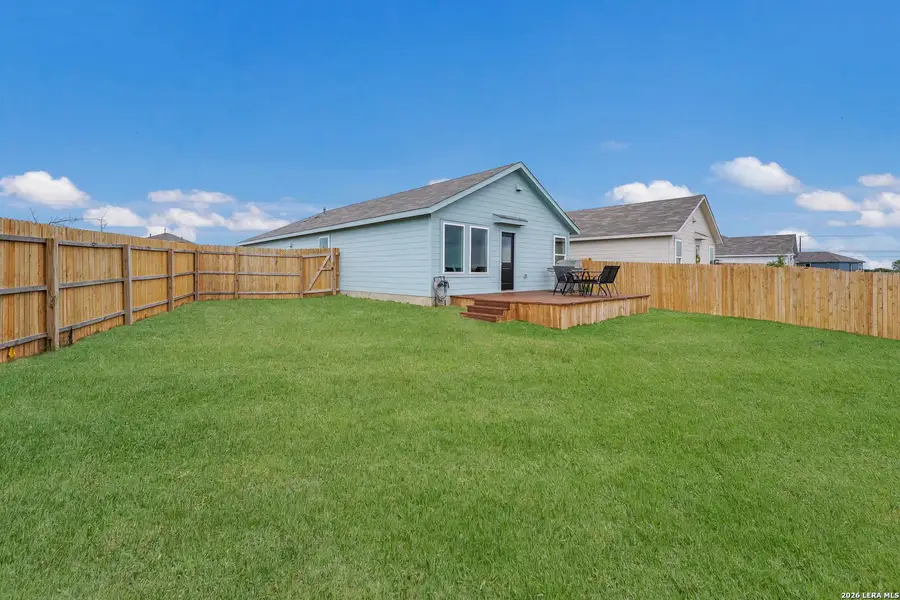 Exterior details and patio area of a home in Spring Grove, Converse (Image 3).