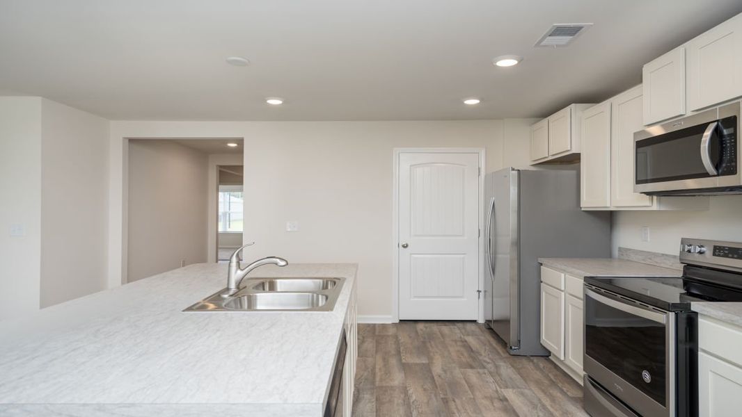 Representative furnished interior of a home built from the ARIA by D.R. Horton in Jordanville Farms, Galivants Ferry (Image 8).