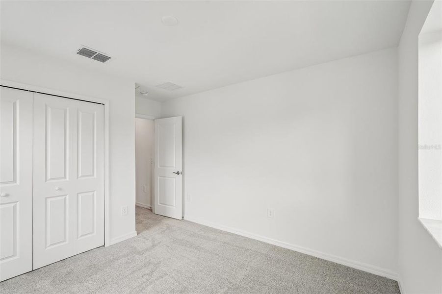 Spacious, unfurnished interior of a new home in Southpointe, Palmetto (Image 23). Spacious, unfurnished interior of a new home in Southpointe, Palmetto (Image 23).