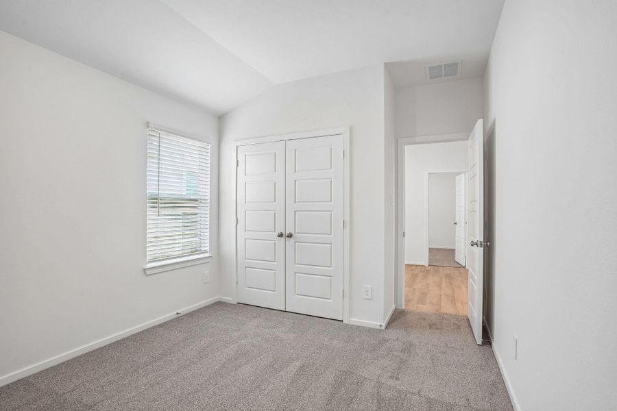 Spacious, unfurnished interior of a new home in Riviera Pines - Premier Series, Huffman (Image 22).