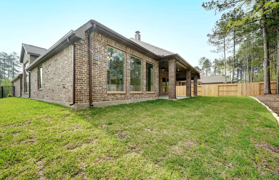 Representative exterior details of a home built from the 3030 by Ravenna Homes in The Woodlands Hills 65′, Willis (Image 26). Representative exterior details of a home built from the 3030 by Ravenna Homes in The Woodlands Hills 65′, Willis (Image 26).