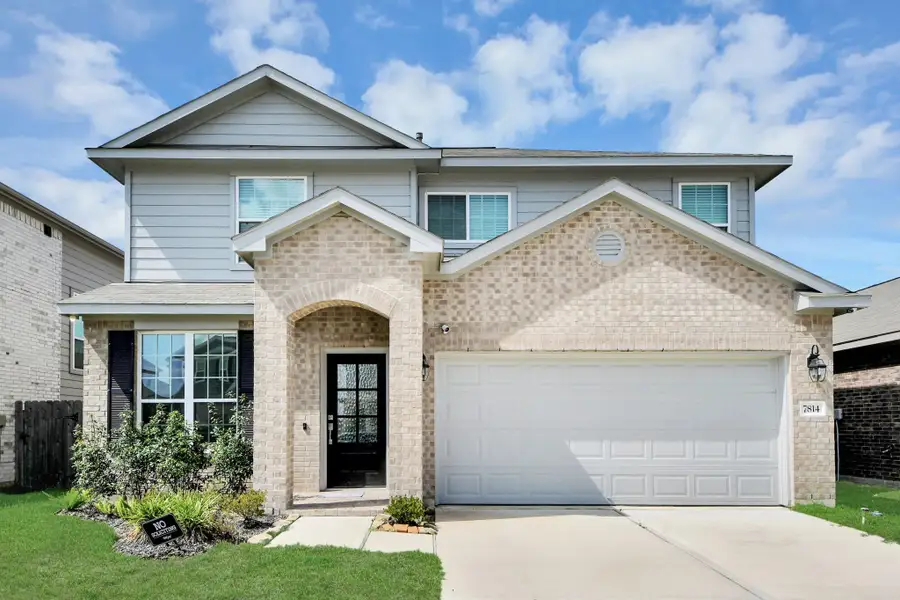 Front exterior of a new home in Willow Trace, Spring, TX, highlighting curb appeal (Image 29).