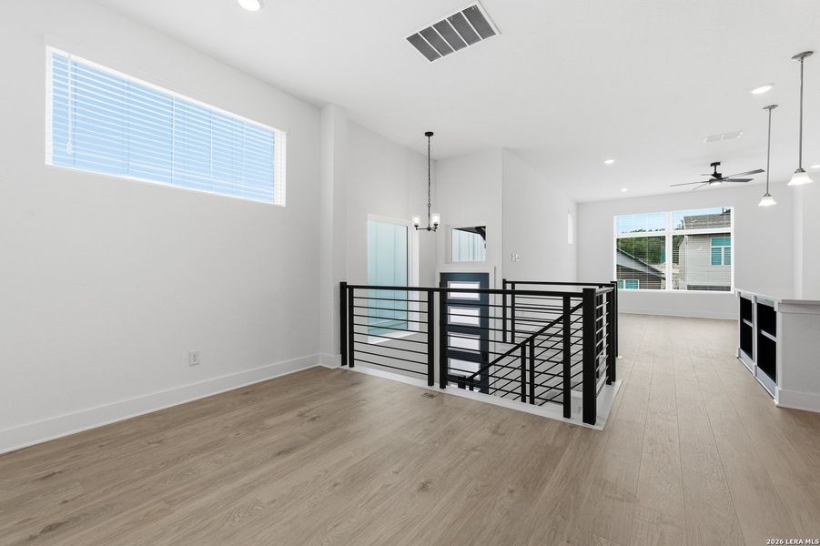 Spacious, unfurnished interior of a new home in Centero at Stone Oak, San Antonio (Image 22).