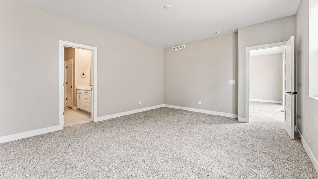 Representative unfurnished interior of a home built from the Pike by Taylor Morrison in The Aurora Highlands Town Collection, Aurora (Image 30).