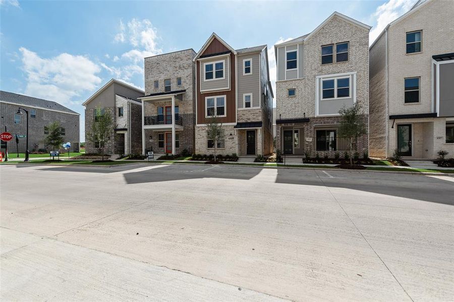 Front exterior of a new home in City Point, North Richland Hills, TX, highlighting curb appeal (Image 2). Front exterior of a new home in City Point, North Richland Hills, TX, highlighting curb appeal (Image 2).