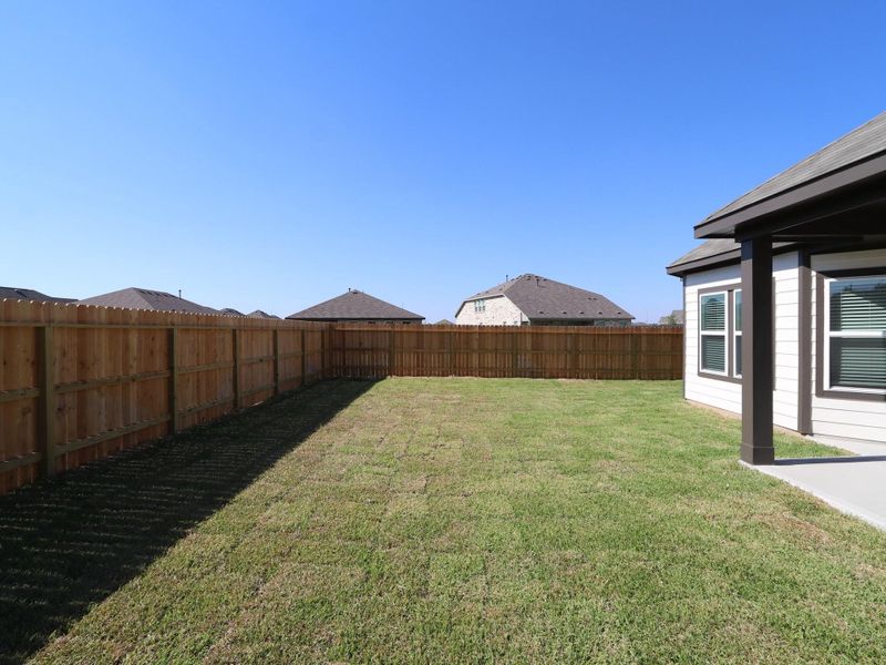 Exterior details and patio area of a home in Miller's Pond, Rosenberg (Image 24). Exterior details and patio area of a home in Miller's Pond, Rosenberg (Image 24).