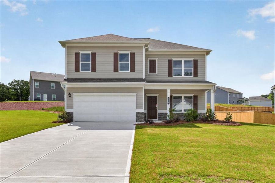Front exterior of a new home in Jones Ridge, Dallas, GA, highlighting curb appeal (Image 29). Front exterior of a new home in Jones Ridge, Dallas, GA, highlighting curb appeal (Image 29).