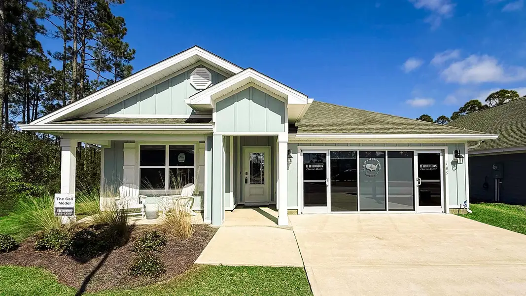 Front exterior of a new home in Palmetto Bluff, Port Saint Joe, FL, highlighting curb appeal (Image 1). Front exterior of a new home in Palmetto Bluff, Port Saint Joe, FL, highlighting curb appeal (Image 1).