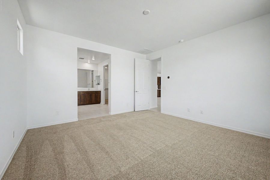 Spacious, unfurnished interior of a new home in Empire Pointe, Queen Creek (Image 12).