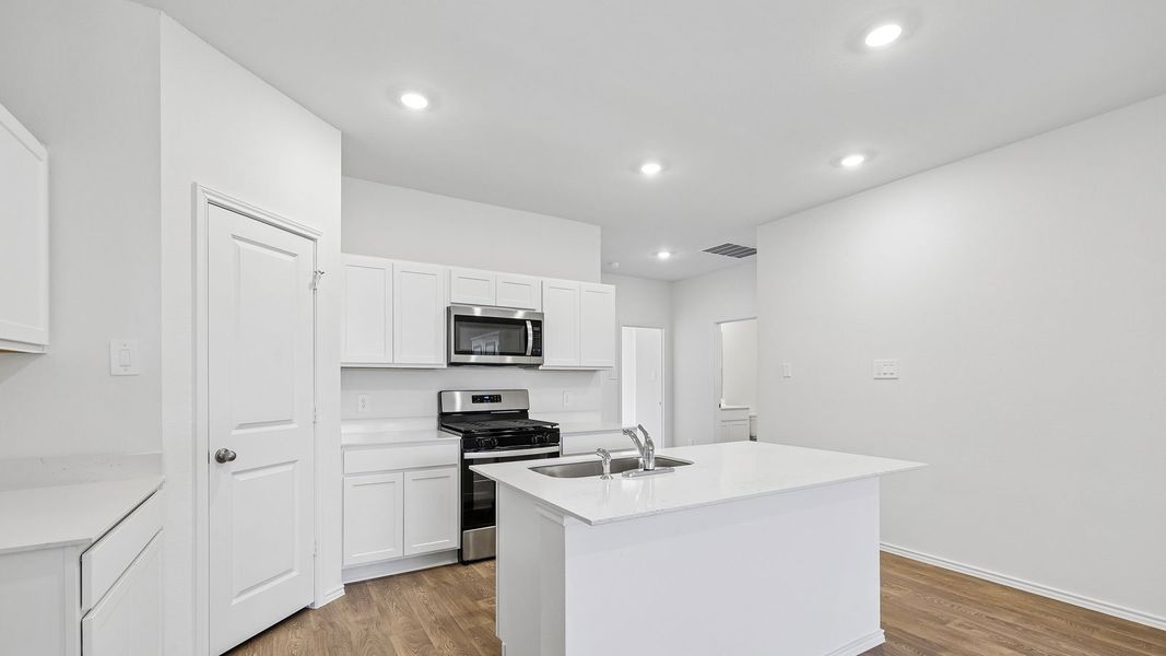 Furnished interior view inside a new home in Wayside, Uhland (Image 8).
