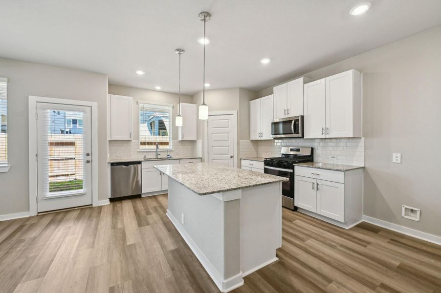 Photo is not of the actual home, but is an inspirational photo of builder’s model home and may depict options, furnishings, and/or decorator features that are not included