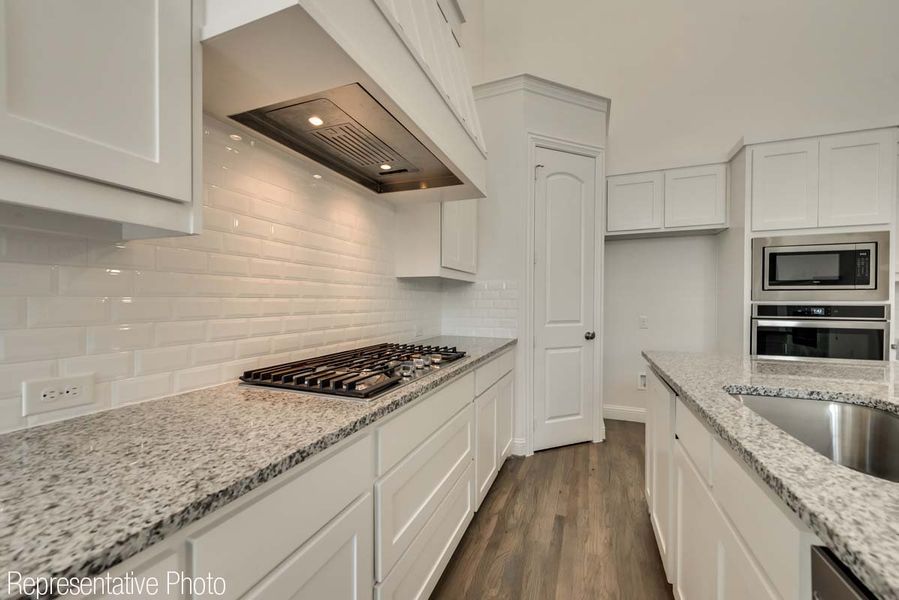 Representative furnished interior of a home built from the Charleston II by Grand Homes in Grand Oaks, Celina (Image 8).