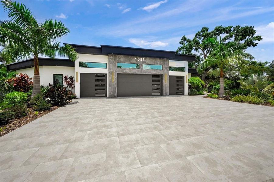 Front exterior of a new home in , Sarasota, FL, highlighting curb appeal (Image 21). Front exterior of a new home in , Sarasota, FL, highlighting curb appeal (Image 21).