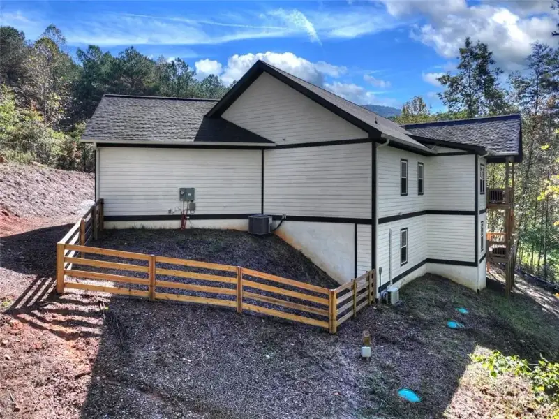 Exterior details and patio area of a home in , Ellijay (Image 24).
