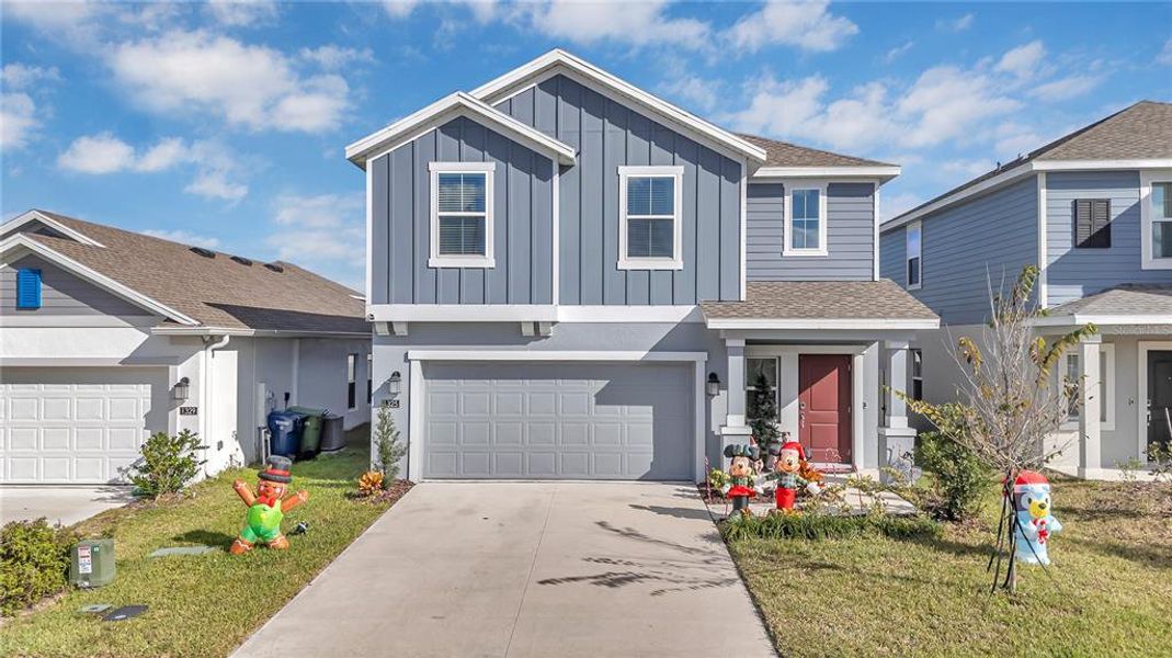Front exterior of a new home in Peace Creek Reserve: Legacy Collection, Winter Haven, FL, highlighting curb appeal (Image 23). Front exterior of a new home in Peace Creek Reserve: Legacy Collection, Winter Haven, FL, highlighting curb appeal (Image 23).