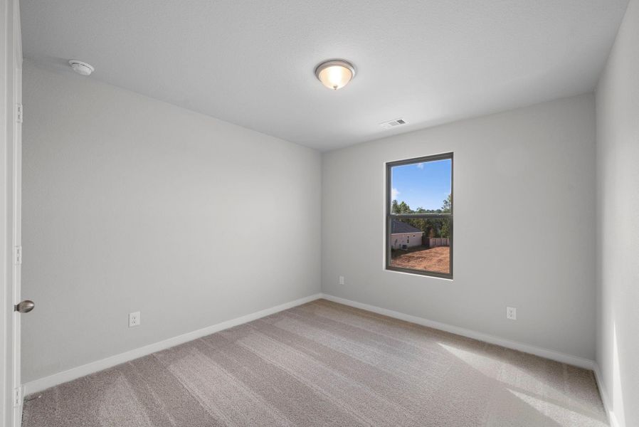 Spacious, unfurnished interior of a new home in Westridge Cove, Conroe (Image 15).