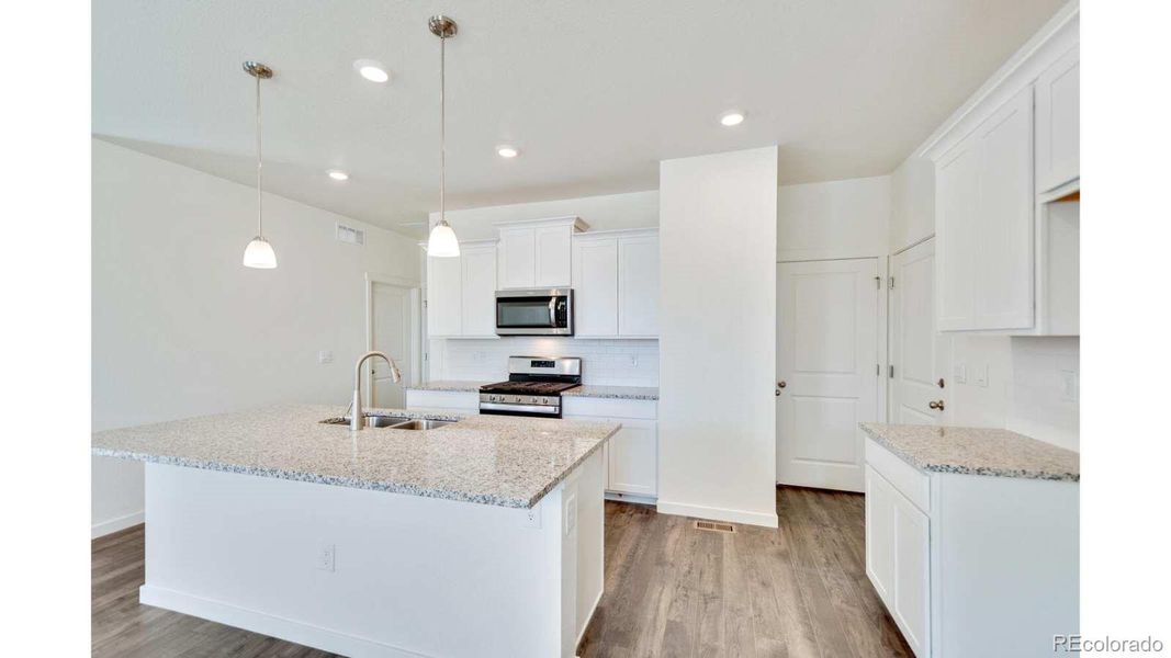 Furnished interior view inside a new home in The Ridge at Lorson Ranch, Colorado Springs (Image 7).