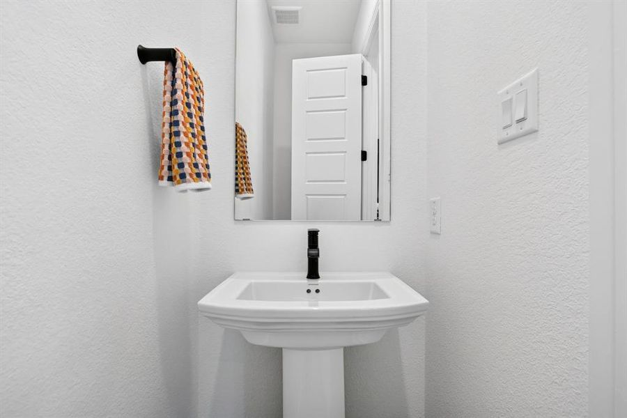 The half bath. Small, but mighty convenient! The half bath. Small, but mighty convenient!