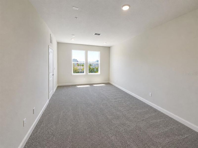 Spacious, unfurnished interior of a new home in Gatherings® of Lake Nona, Orlando (Image 17). Spacious, unfurnished interior of a new home in Gatherings® of Lake Nona, Orlando (Image 17).