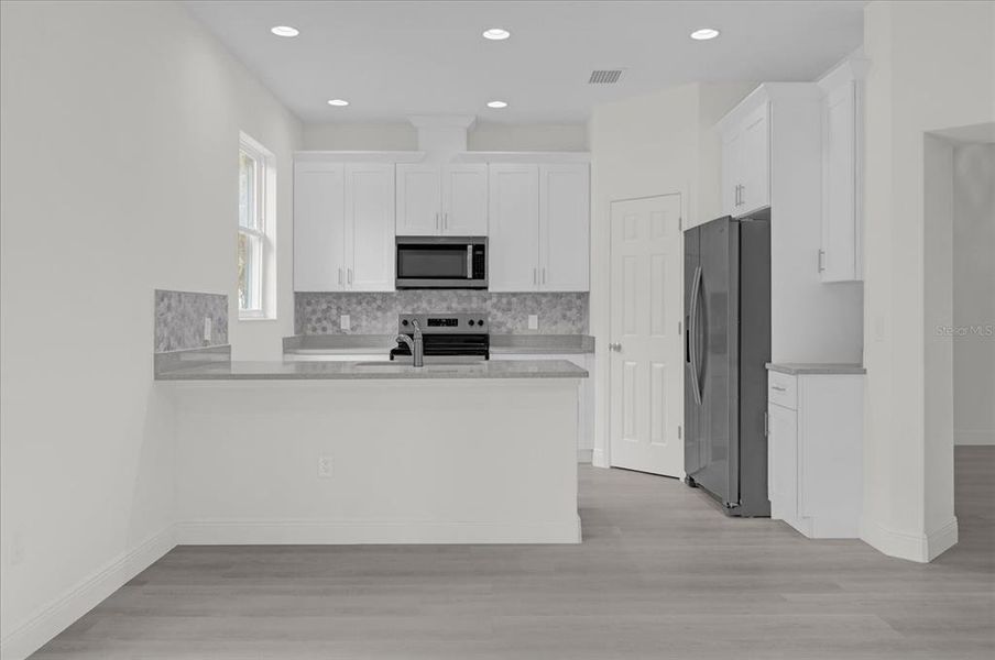 Living room looking into Kitchen