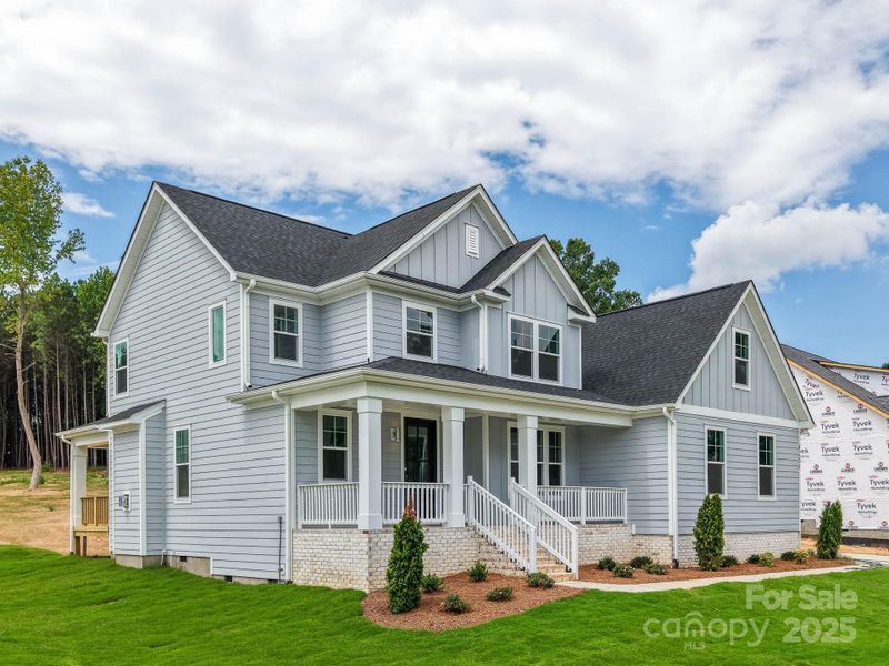 Front exterior of a new home in , Sherrills Ford, NC, highlighting curb appeal (Image 18). Front exterior of a new home in , Sherrills Ford, NC, highlighting curb appeal (Image 18).