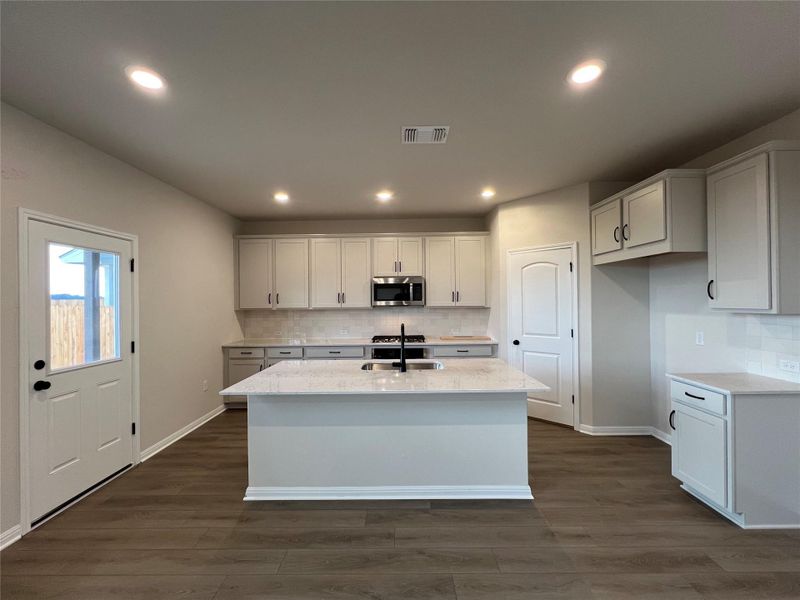 Furnished interior view inside a new home in Rolling Glen, Hutto (Image 7).