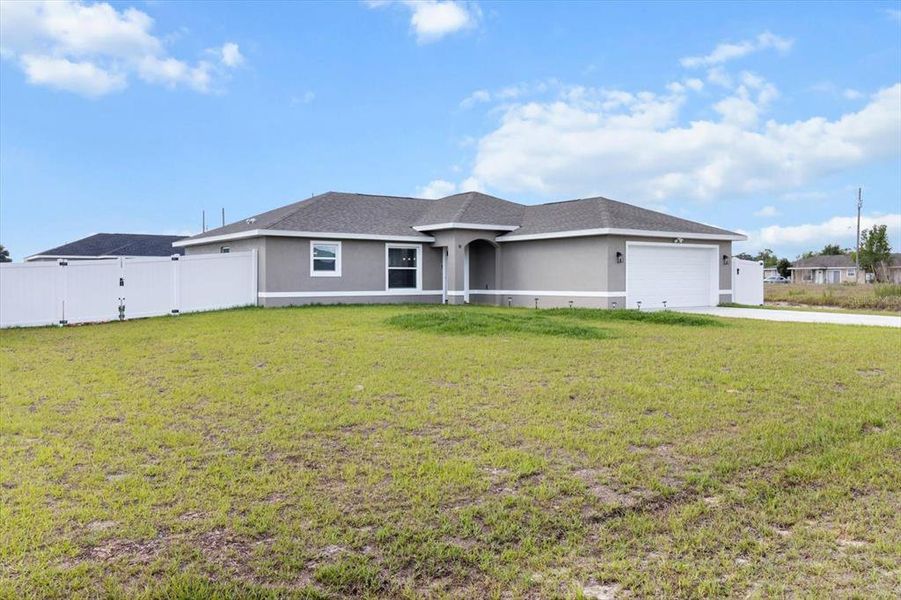 Front exterior of a new home in , Ocala, FL, highlighting curb appeal (Image 29).