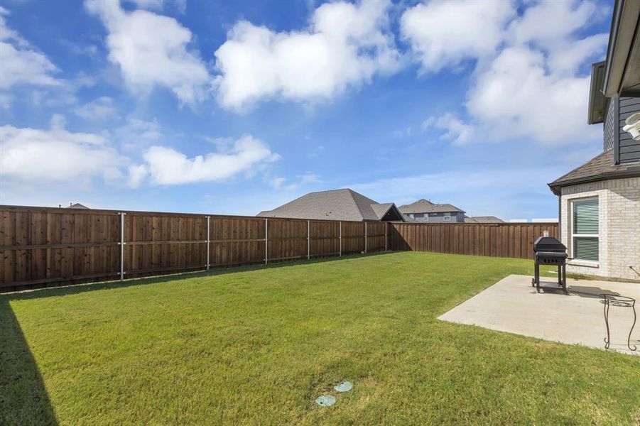 View of yard with a patio area