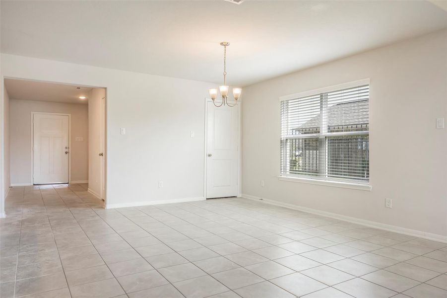 Spacious, unfurnished interior of a new home in Sunterra, Katy (Image 23).