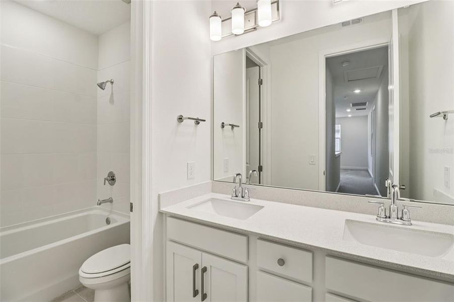 Furnished interior view inside a new home in Legends Preserve - Signature Series, Daytona Beach (Image 14).