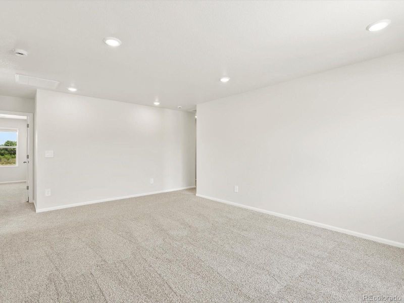 Spacious, unfurnished interior of a new home in Poudre Heights: The Lakes Collection, Windsor (Image 38).