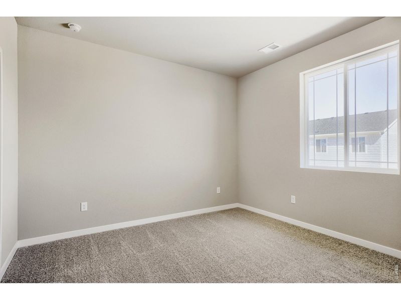 Spacious, unfurnished interior of a new home in Farmstead, Berthoud (Image 28).
