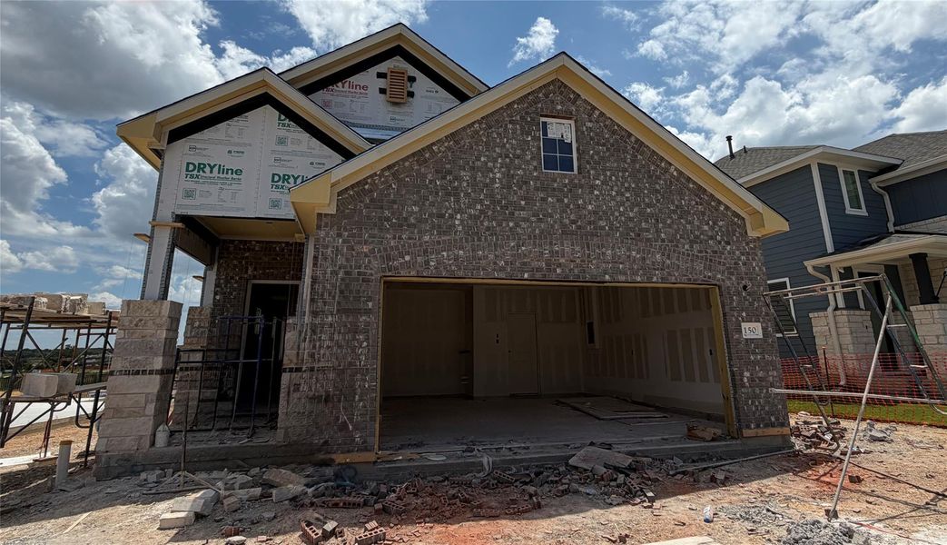 In-progress construction of a new home in Lariat, Liberty Hill, TX (Image 21).