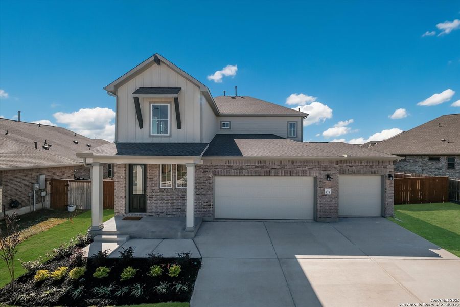 Front exterior of a new home in Foxbrook, Schertz, TX, highlighting curb appeal (Image 2).