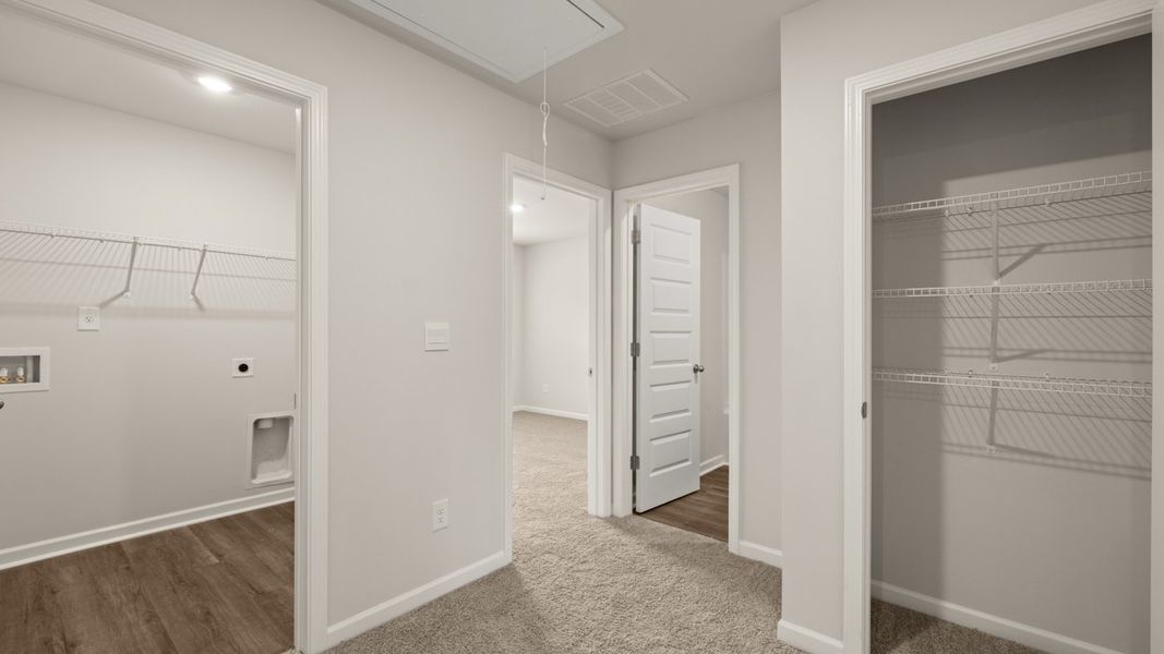 Representative unfurnished interior of a home built from the ANSLEY Express by D.R. Horton in WillowBrook, Winder (Image 24).